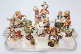 Collection of eight Hummel children figures and groups.