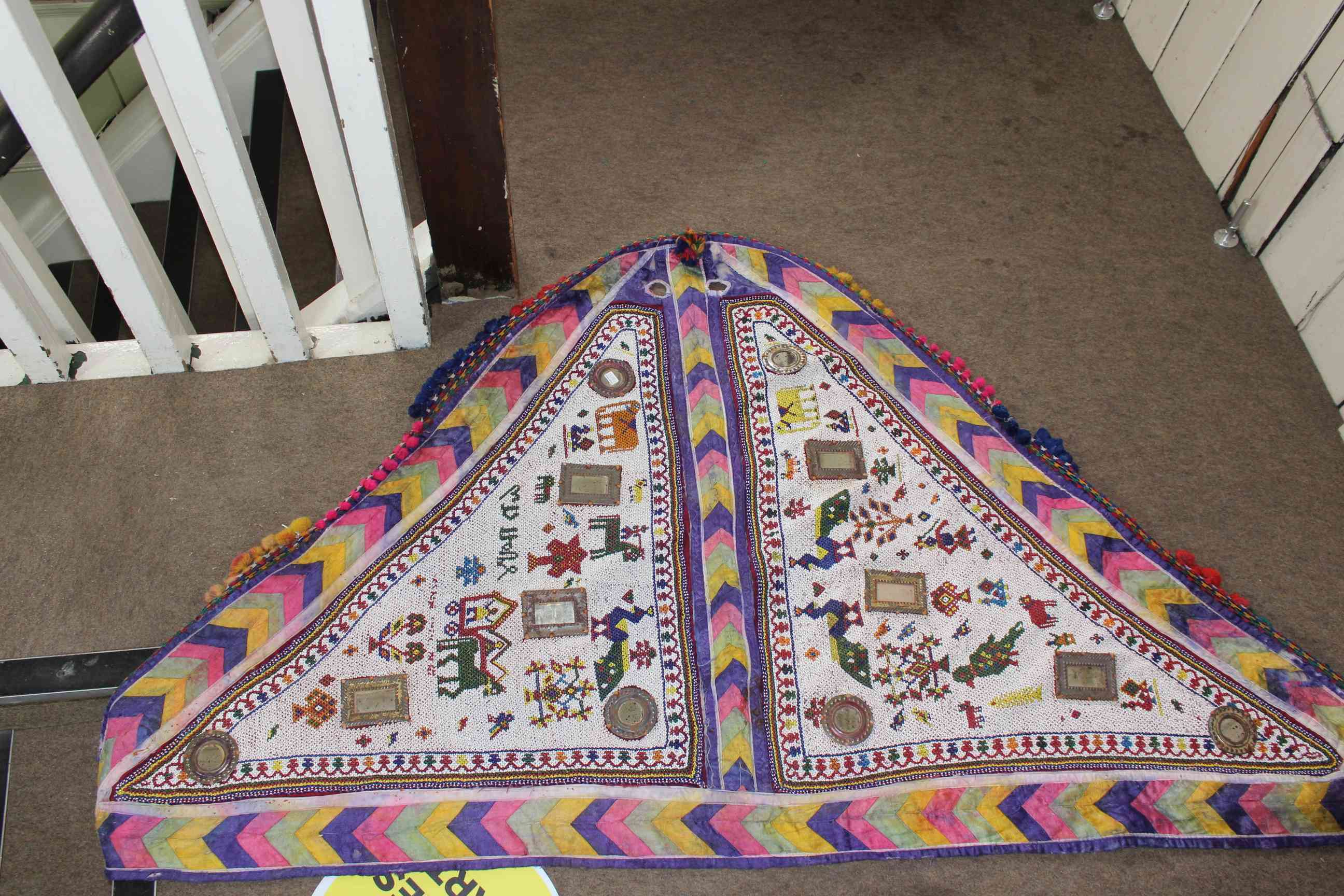 Eastern beadwork saddle cover 1.75 by 0.93.