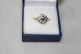 Diamond nine stone 18 carat gold cluster ring, size O/P.