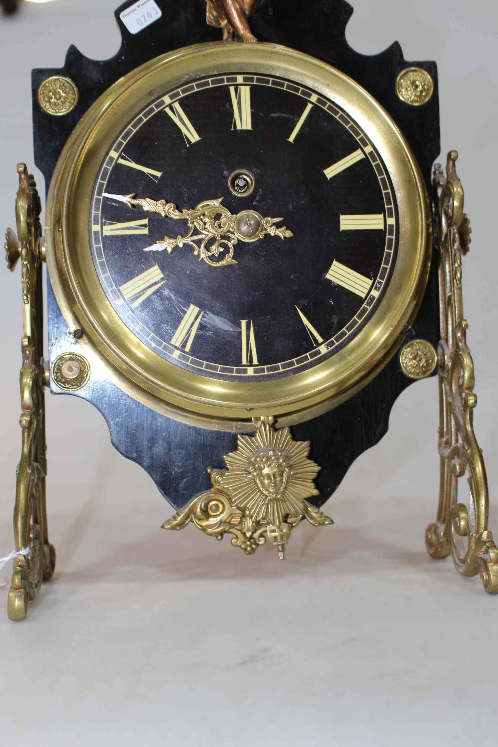 Ornate French gilt metal mantel clock with cherub surmount, 35cm. - Image 4 of 4