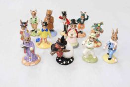 Twelve Royal Doulton Bunnykins figures in boxes including 'Out for a Duck'.