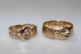 Two 9 carat gold gents buckle design rings.