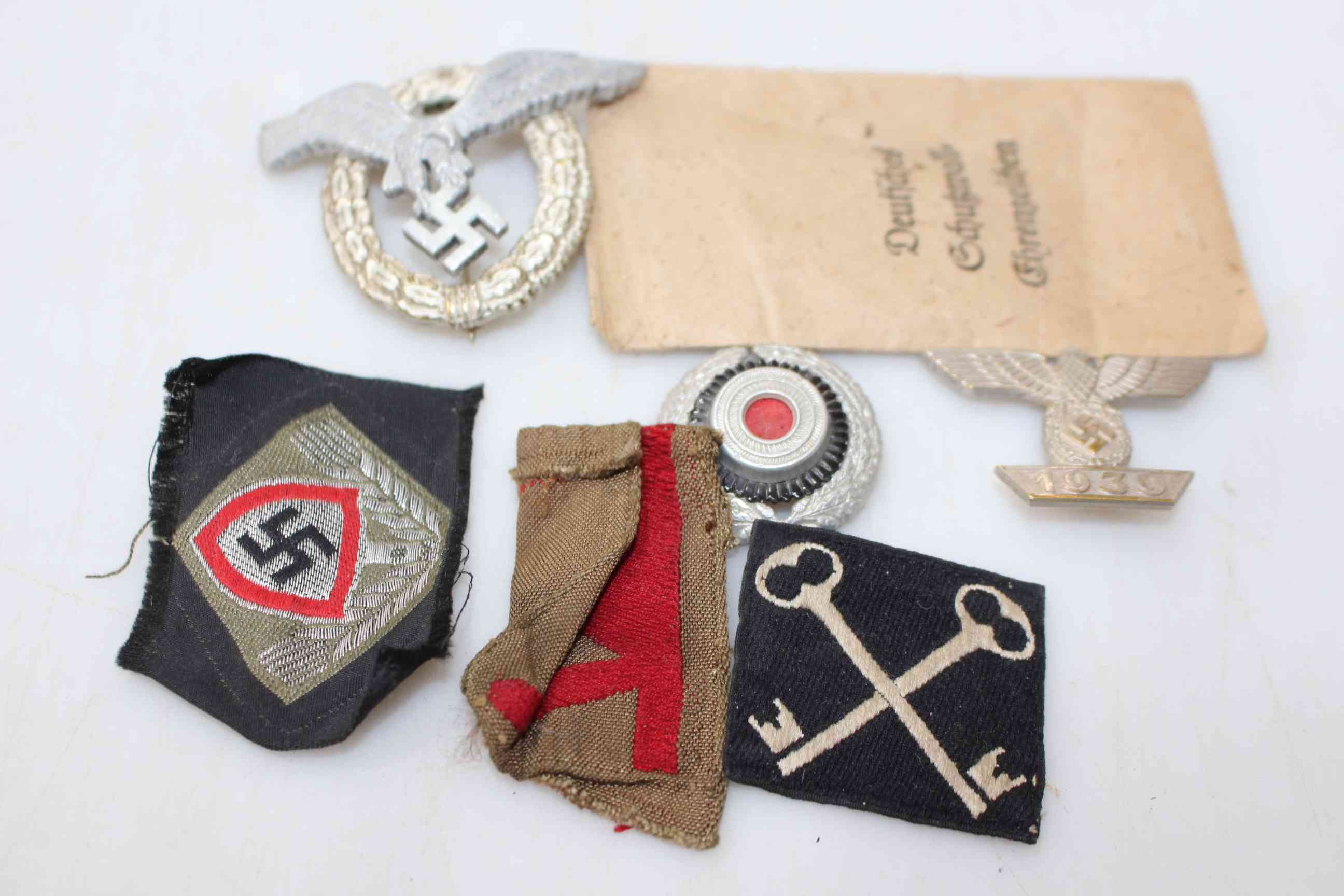 Small collection of German military medal and badges.