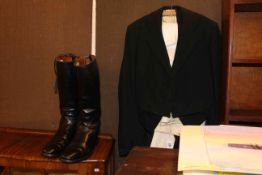 Frocked coat and waistcoat and a pair of riding boots.