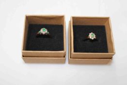 Two emerald and diamond cluster 9 carat gold rings, sizes M and N/O.