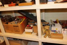 Full shelf of vintage jigsaws, games and toys, model aircraft, model vehicles, mousetrap etc.