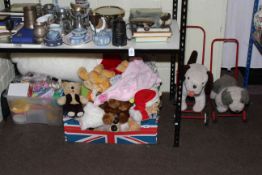 Push-Along toys, soft toys, baby walkers, two rocking horses and boxes of toys.