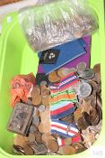 Box of loose coinage including pre-1947 silver together with WWII war medals on ribbons.