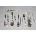 Collection of assorted silver spoons, tongs, silver handled shoe horn, EP letter opener etc.