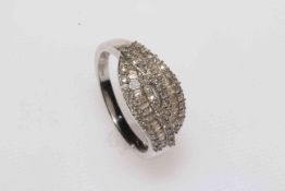 Diamond multi-stone crossover set 9 carat white gold ring, size S.