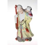 Chinese figure of elder with child, 31cm.