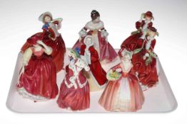 Eight Royal Doulton figures including Autumn Breezes, Christmas Morn, Top O' the Hill x 2,