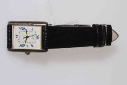 Must de Cartier ladies wristwatch with Roman numeral dial on leather strap.