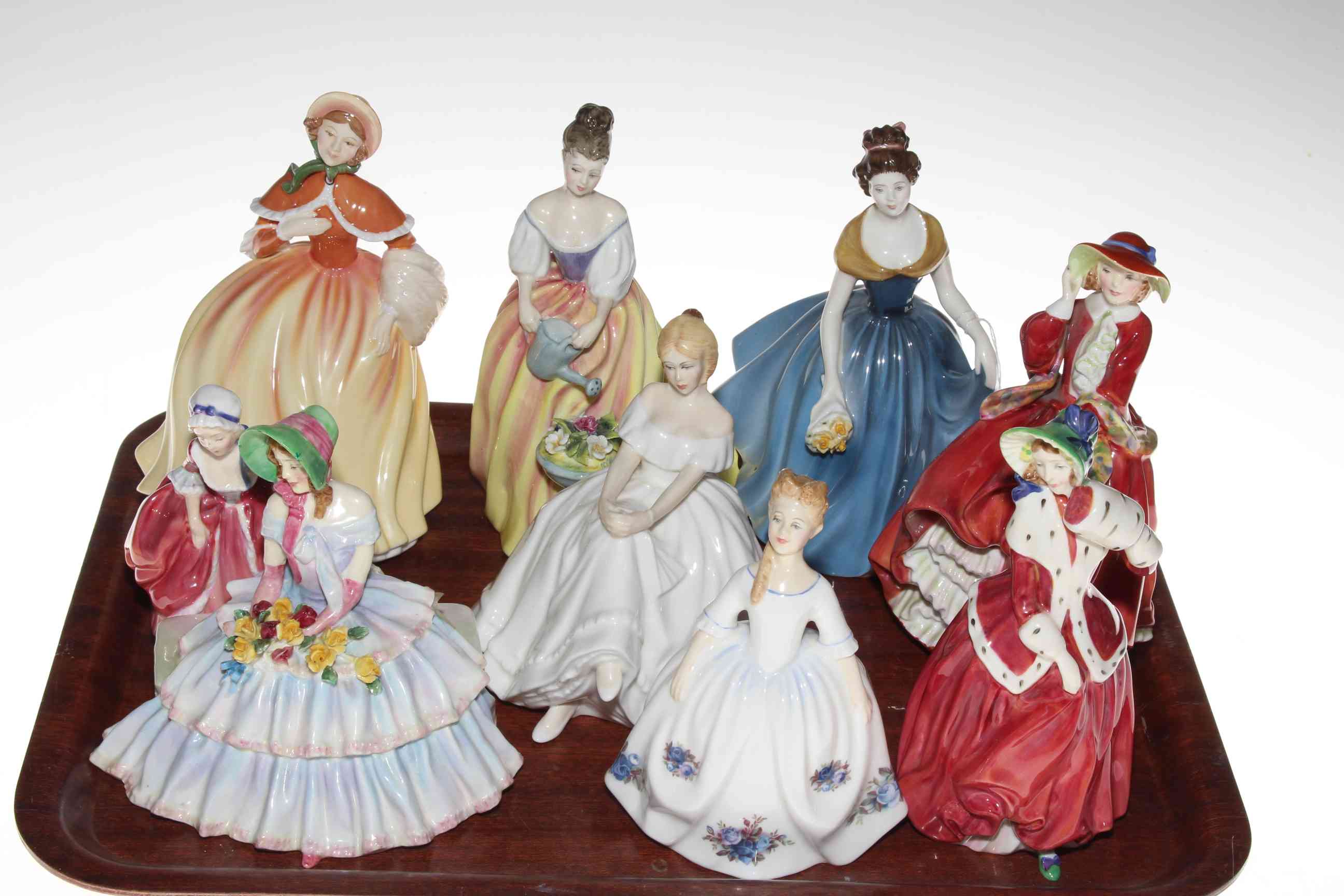 Nine Royal Doulton figures including Top O' the Hill, Christmas Morn, Alexandra, Heather, etc.