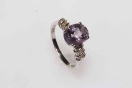 Amethyst and diamond 9 carat white gold ring, size P.