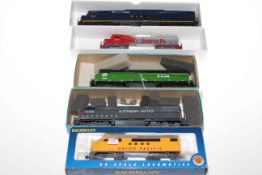 Five American locomotives, three with boxes.