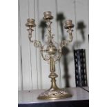 Ornate three branch brass candelabrum, 41cm high.