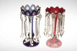 Two Victorian overlay blue and ruby glass lustres with drops, 27cm.