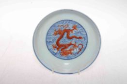Chinese saucer dish with iron red dragon internal and external decoration, six character mark,