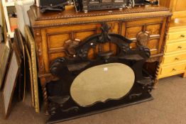 Jacobean style card oak sideboard and ebonised overmantel mirror (2).