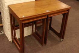 McIntosh teak fold top nest of three tables (largest 60cm by 74cm by 40.5cm).