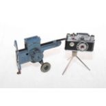 Lehmann tinplate toy cannon, 13cm length, and novelty camera cigarette lighter (2).