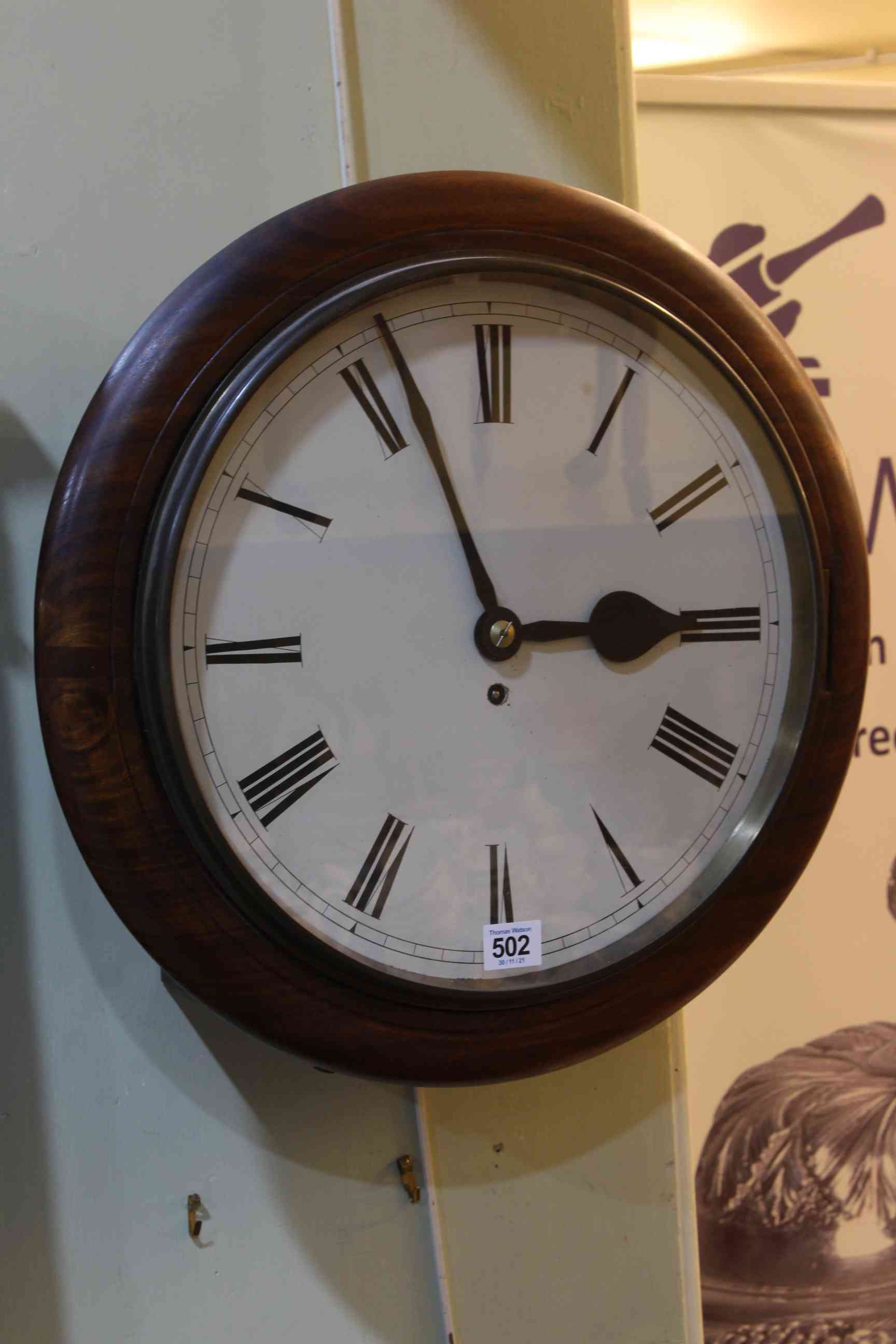 Circular mahogany cased fusee wall clock.