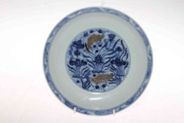 Chinese blue and white saucer dish with gilt fish decoration, six character mark, 23cm.