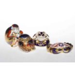 Four Royal Crown Derby paperweights, monkeys, owl, frog and crab.