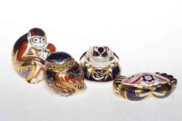 Four Royal Crown Derby paperweights, monkeys, owl, frog and crab.
