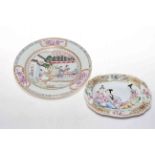 Two Chinese Export polychrome plates with figure decoration, 22.5cm diameter and 18.5cm across.