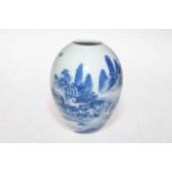 Chinese blue and white vase with continuous landscape decoration, six character mark, 10cm.