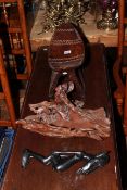 Carved tribal head rest, naturalistic wood sculpture, ebonised tribal figure and an antique stool.