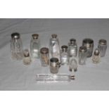 Collection of fourteen silver topped toilet bottles.