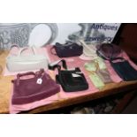 Collection of ladies handbags, purses, umbrella (all marked Radley).