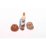 Three Japanese pottery netsuke.