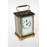 French gilt brass carriage clock.