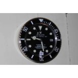 Black and silver Quartz kitchen wall clock.