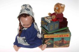 Vintage telephone bear in box and an old doll.