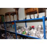 Full shelf of glass and china including Indian Tree table ware, glassware, teaware, cutlery,