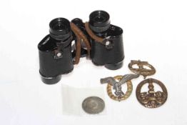 WWII French military binoculars and a collection of four German medals.
