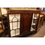 1920's mahogany three door cabinet bookcase on ball and claw legs, 141.5cm x 136.5cm x 36cm.