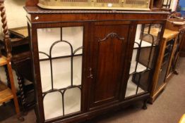 1920's mahogany three door cabinet bookcase on ball and claw legs, 141.5cm x 136.5cm x 36cm.