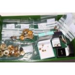 Collection of assorted earrings including some 9 carat gold.