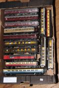 Collection of approximately 30 model railway carriages.