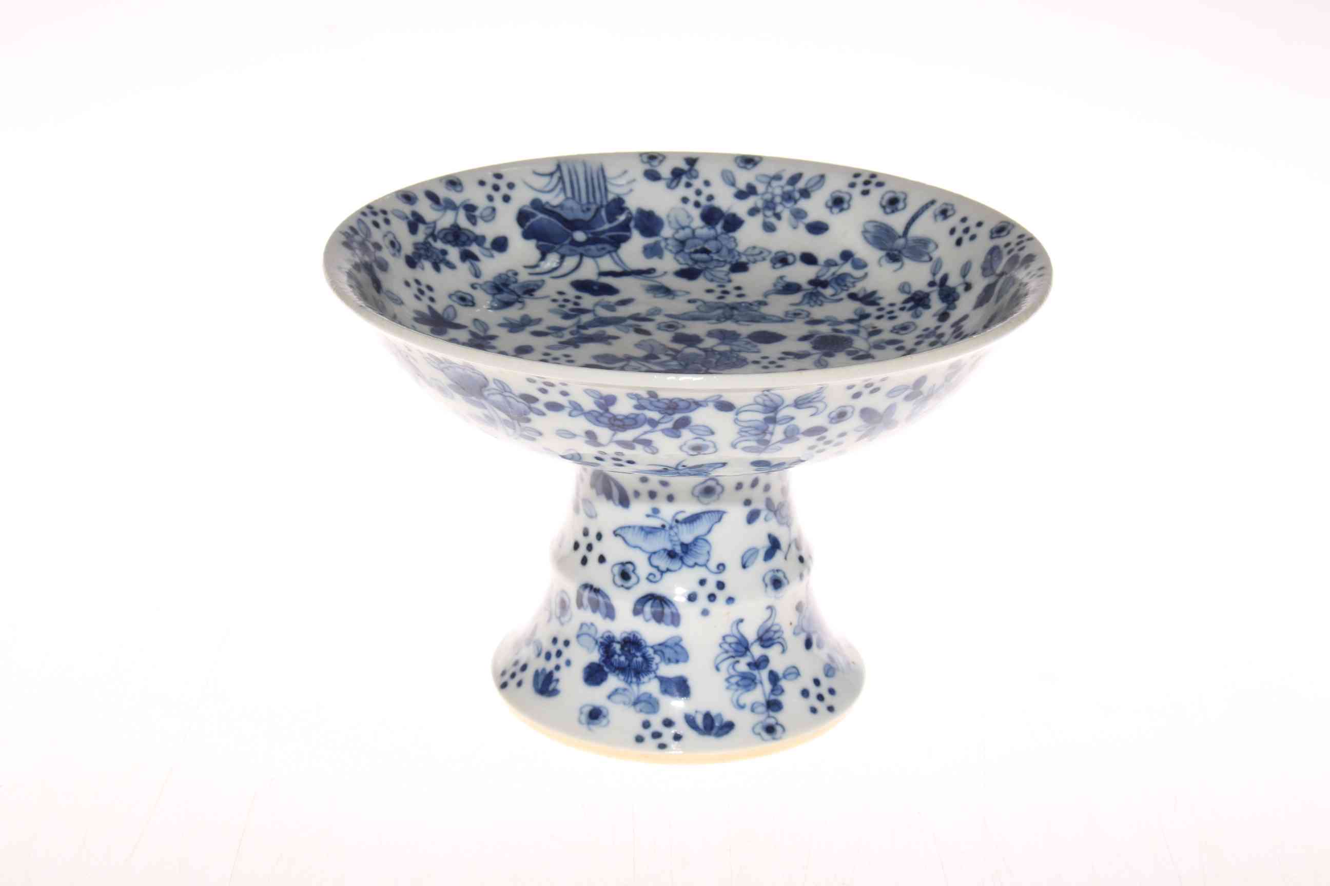 Chinese blue and white tazza with insert and foliage decoration, 14cm high.