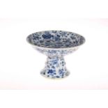 Chinese blue and white tazza with insert and foliage decoration, 14cm high.