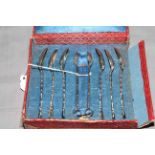 Boxed set of Chinese silver teaspoons and tongs.