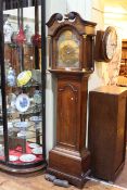 Antique oak 8-day longcase clock having arched brass dial, by Valen Downs, Louth.