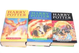 Three limited edition Harry Potter books.